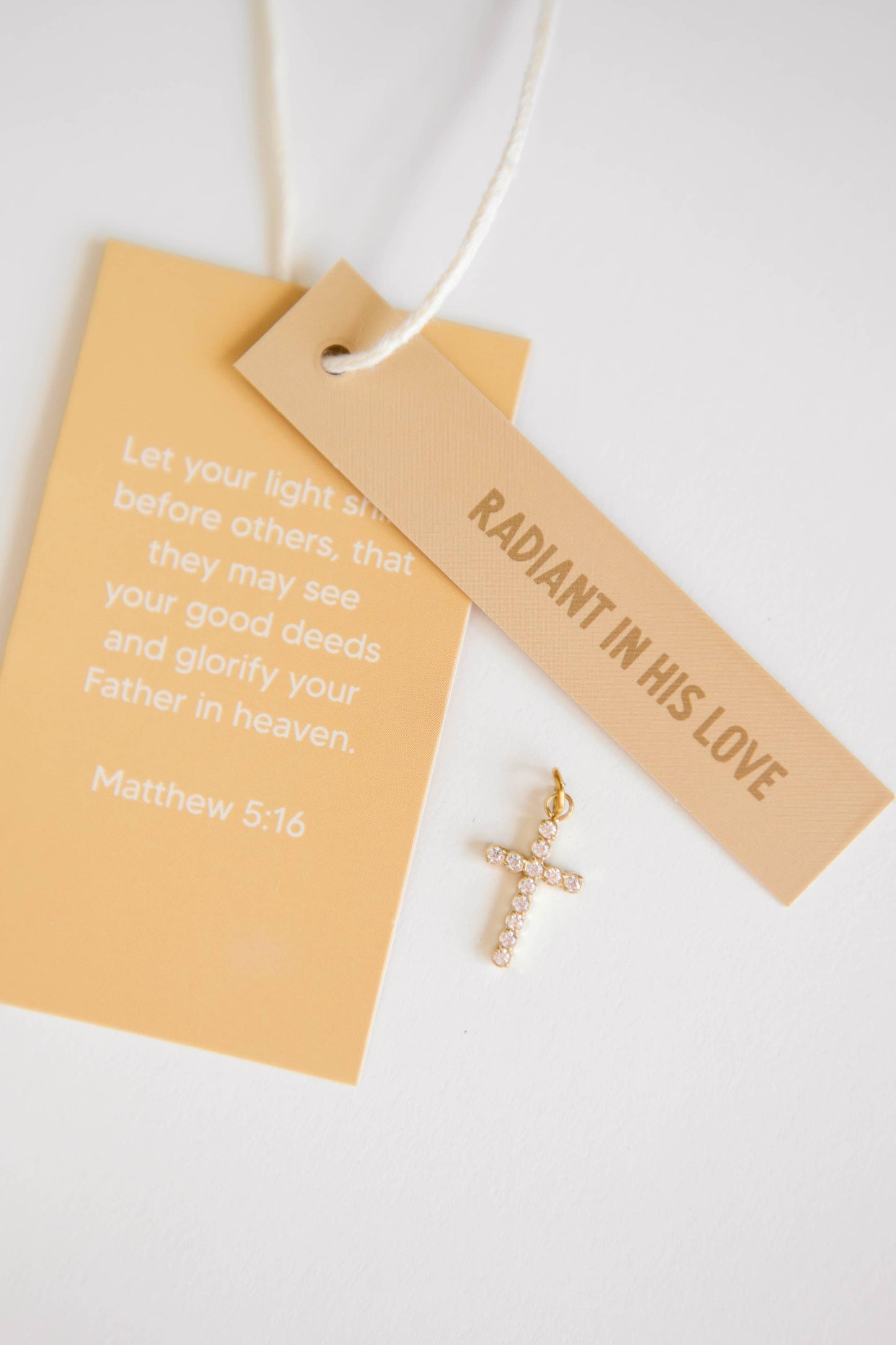Radiant Cross Charm